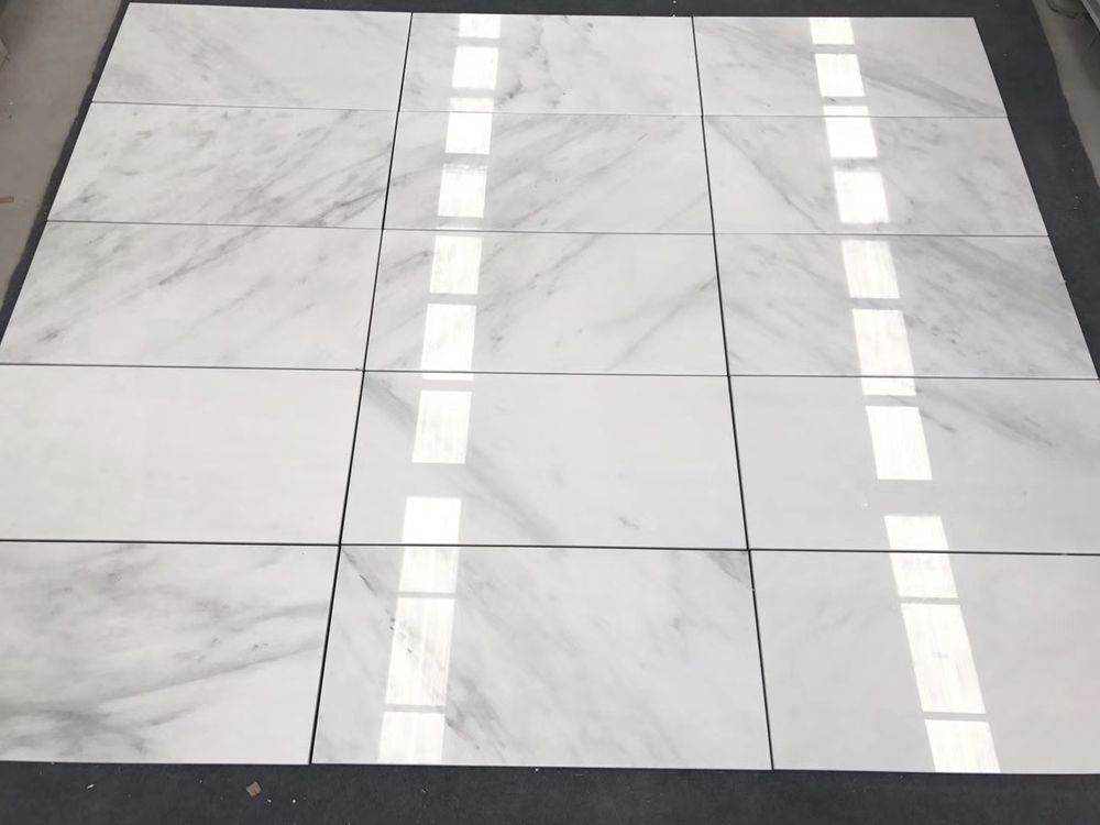 Polished Oriental White marble tiles with light grey veining
